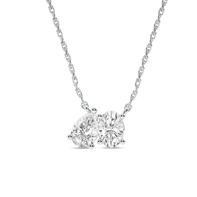 Close-up profile of a woman wearing the Kismet white gold lab-grown diamond necklace, featuring brilliant stones set on a delicate chain