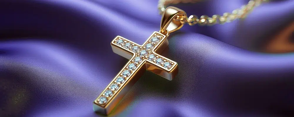 Channel-set lab-grown diamond cross pendant necklace in 18k yellow gold.