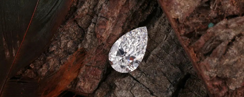 High-quality loose pear shaped diamond showing excellent symmetry and brilliance for a custom engagement ring setting.