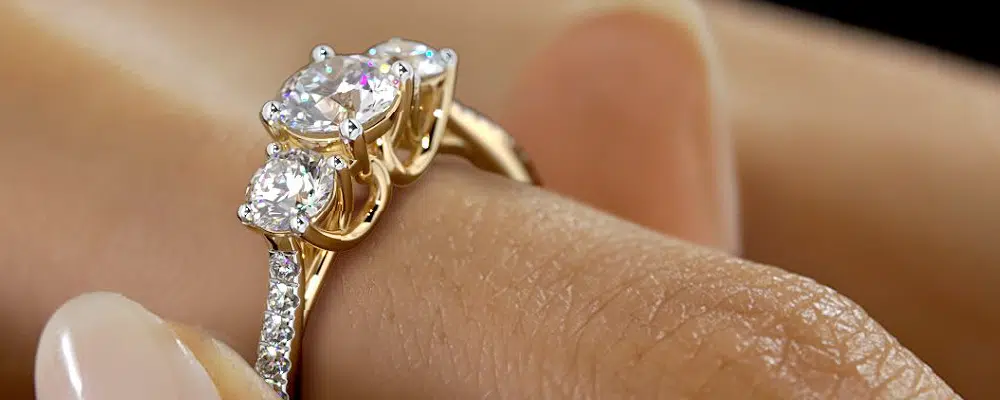 The Timeless Elegance of a Three Stone Engagement Ring and the Rise of Man Made Diamonds