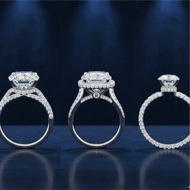 Three-view showcase of a round brilliant diamond engagement ring with a tapered pavé diamond shank in platinum.