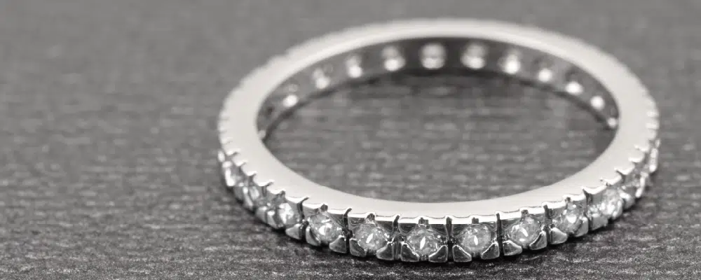 Round brilliant lab-grown diamond eternity band in white gold.