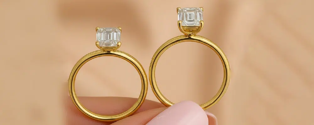 Two emerald cut diamond solitaire rings in yellow gold settings showing different band thicknesses and alloy lusters.