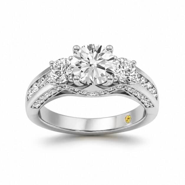 Front view of a white gold three-stone engagement ring featuring an Round lab-grown diamond center stone, two round side diamonds, a hidden accent gallery, and a pave-set band on a plain white background.