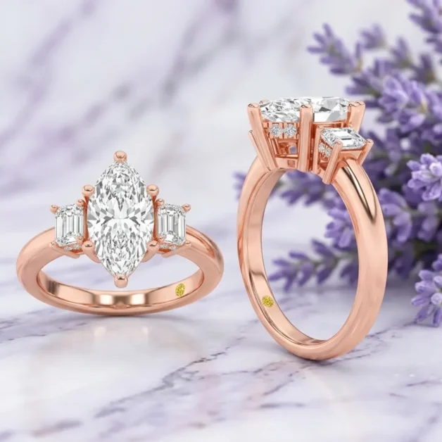 Rose gold three-stone anniversary ring featuring a center marquise diamond flanked by emerald cut side stones